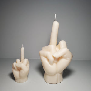 middle finger, candle, rebellion, protest, defiance, expression, gesture, humor, unconventional, statement, controversy, controversial, bold, irreverent, dissent, iconoclast, nonconformity, rebellious art, cheeky, symbolic, protest candle, counterculture, defiance symbol, edgy, unconventional design, cultural dissent, provocative, controversial art, rebellious spirit, bold statement.