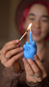 middle finger, candle, rebellion, protest, defiance, expression, gesture, humor, unconventional, statement, controversy, controversial, bold, irreverent, dissent, iconoclast, nonconformity, rebellious art, cheeky, symbolic, protest candle, counterculture, defiance symbol, edgy, unconventional design, cultural dissent, provocative, controversial art, rebellious spirit, bold statement.